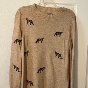 Chico’s beige sweater w appliquéd cougars.  Size 2